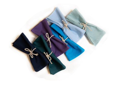 Fingercraft navy napkins provide reusable décor for eco-friendly hosting.
