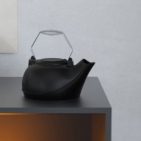 Fire Beauty stove-top operation shows kettle on heat with rising steam