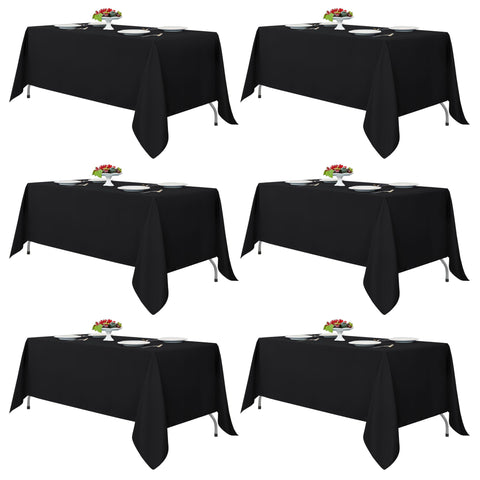 Fitable black rectangle tablecloth 70x120 on table for elegant dining.