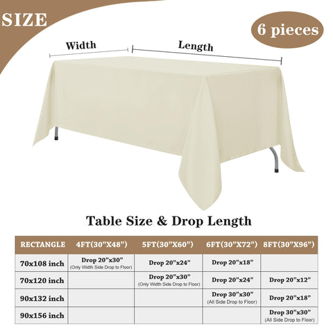 Elegant Fitable Ivory Tablecloth on rectangular table for wedding reception.