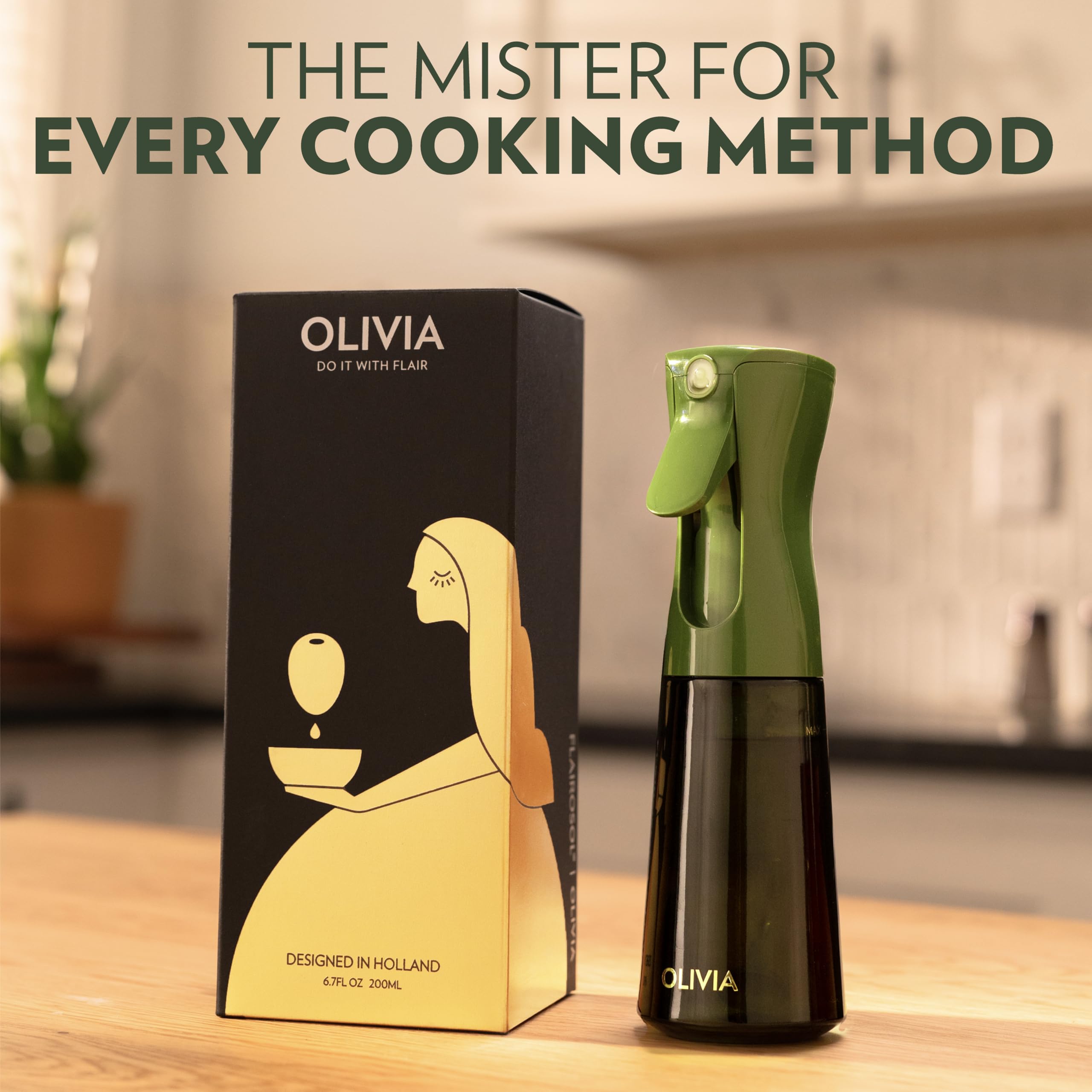 FLAIROSOL OLIVIA glass bottle with anti-drip trigger in action for mess-free cooking.