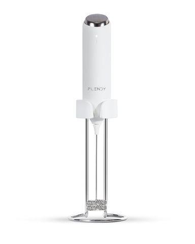 Flendy rechargeable milk frother on USB-C charging bracket stand for convenient counter storage