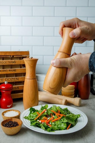 Handcrafted cherry Border Grill Pepper Mill from Maine showcases USA craftsmanship and durability.