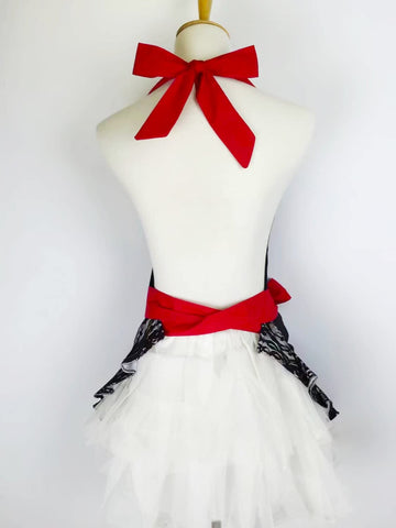 Floosum model wearing lace apron shows fashion-forward kitchen wear for home cooks