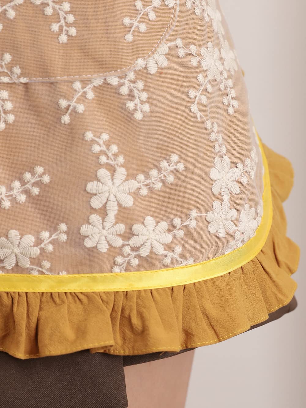 Floosum gift-ready yellow apron, a thoughtful present for loved ones.