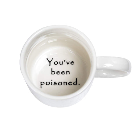FLY SPRAY poisoned mug handle highlights easy grip for comfortable sipping at work