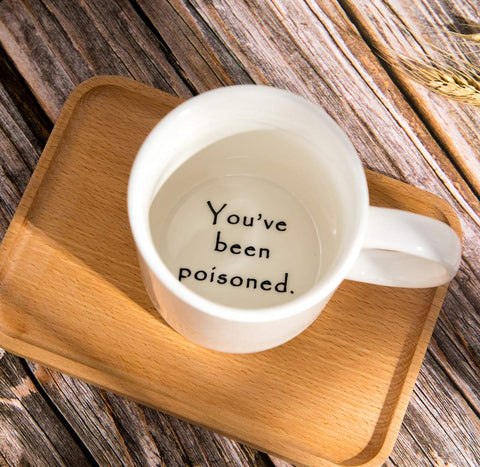 FLY SPRAY poisoned mug text view displays humorous slogan for playful banter