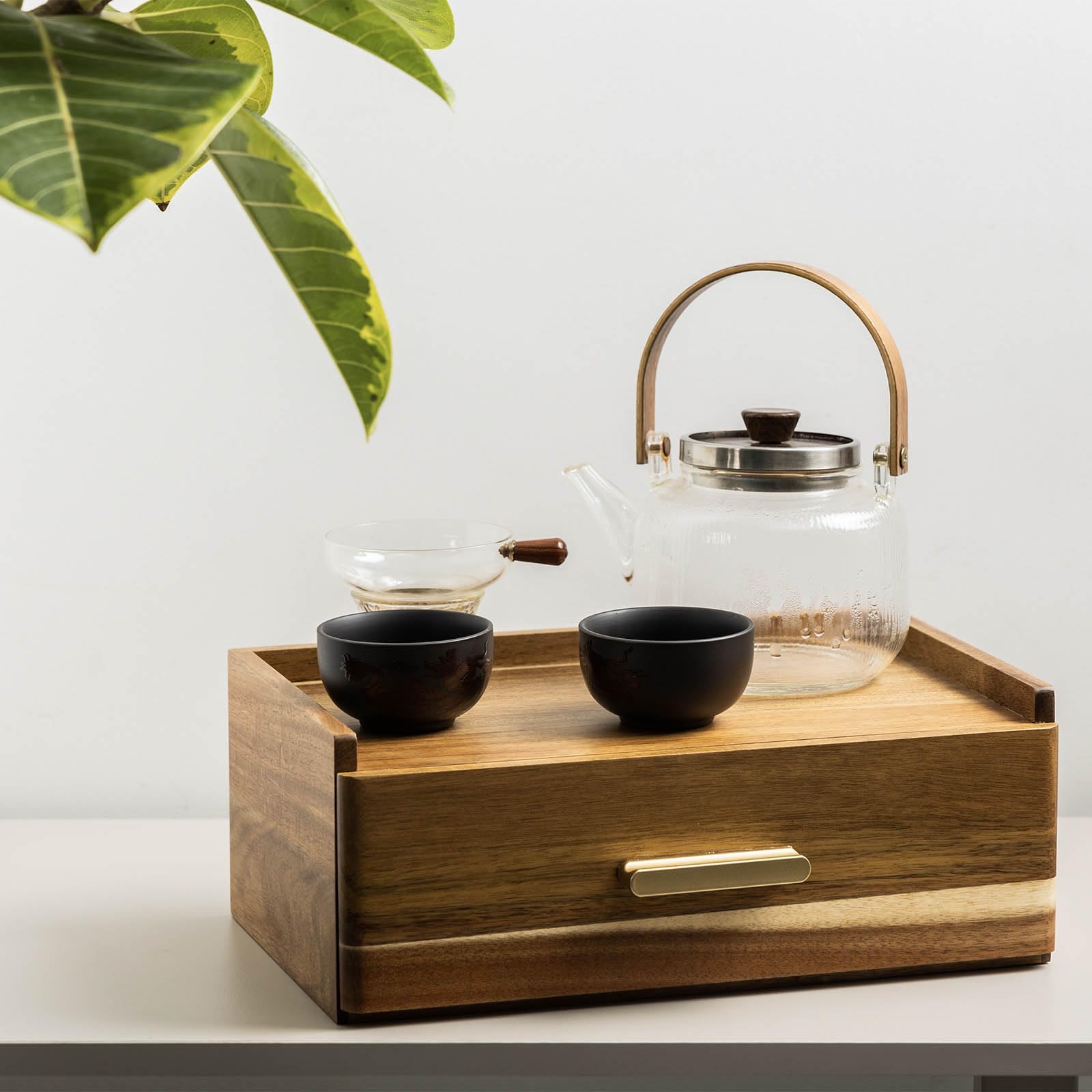 Flyiee Acacia Tea Bag Organizer eight compartments organize tea bags neatly.