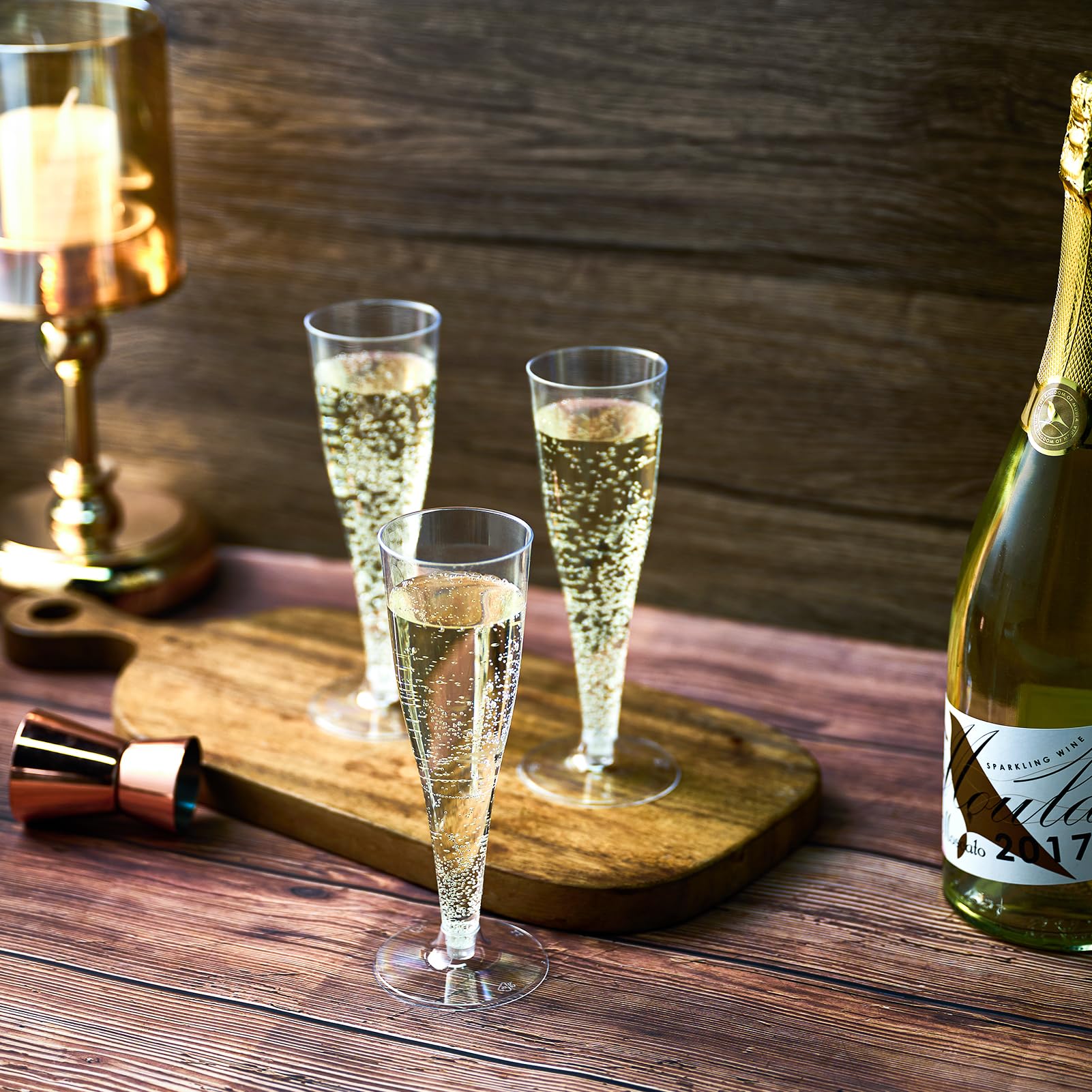 FOCUSLINE clear plastic champagne glasses enhance wedding reception tables