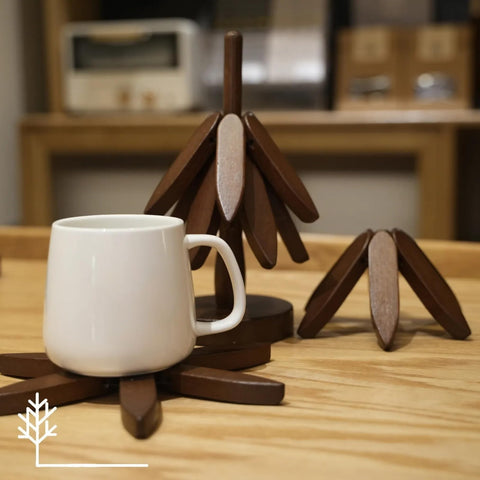 Folded stand and coasters save space in small modern kitchens.