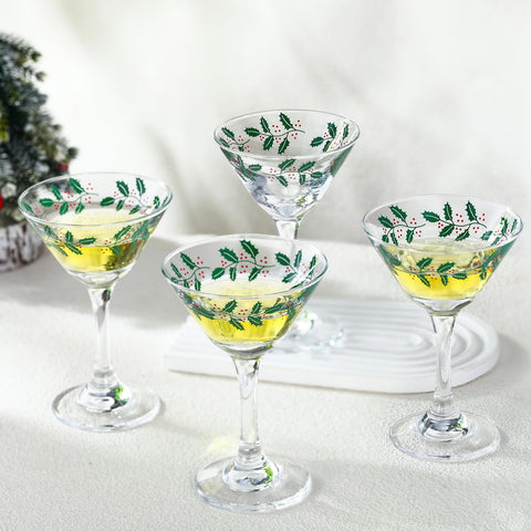 FoldTier red and green holiday cocktail glasses elevate the table setting.
