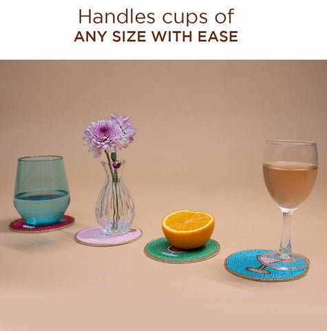 Folkulture round coasters protect tabletops while adding stylish touches to coffee or cocktails.