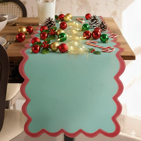 Folkulture Christmas table runner in green with scalloped edge for festive dining