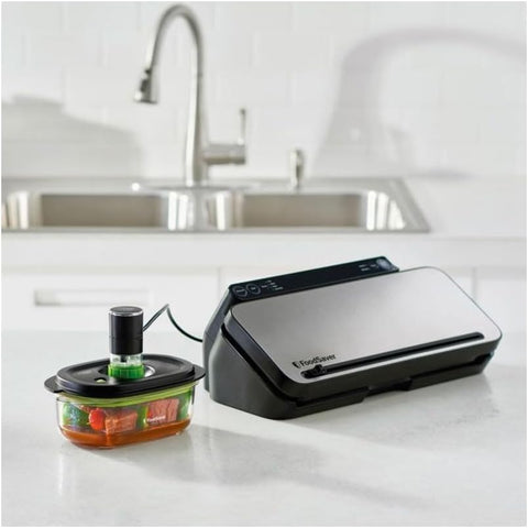 FoodSaver vacuum-indicator lid shows when seal is achieved for freshness