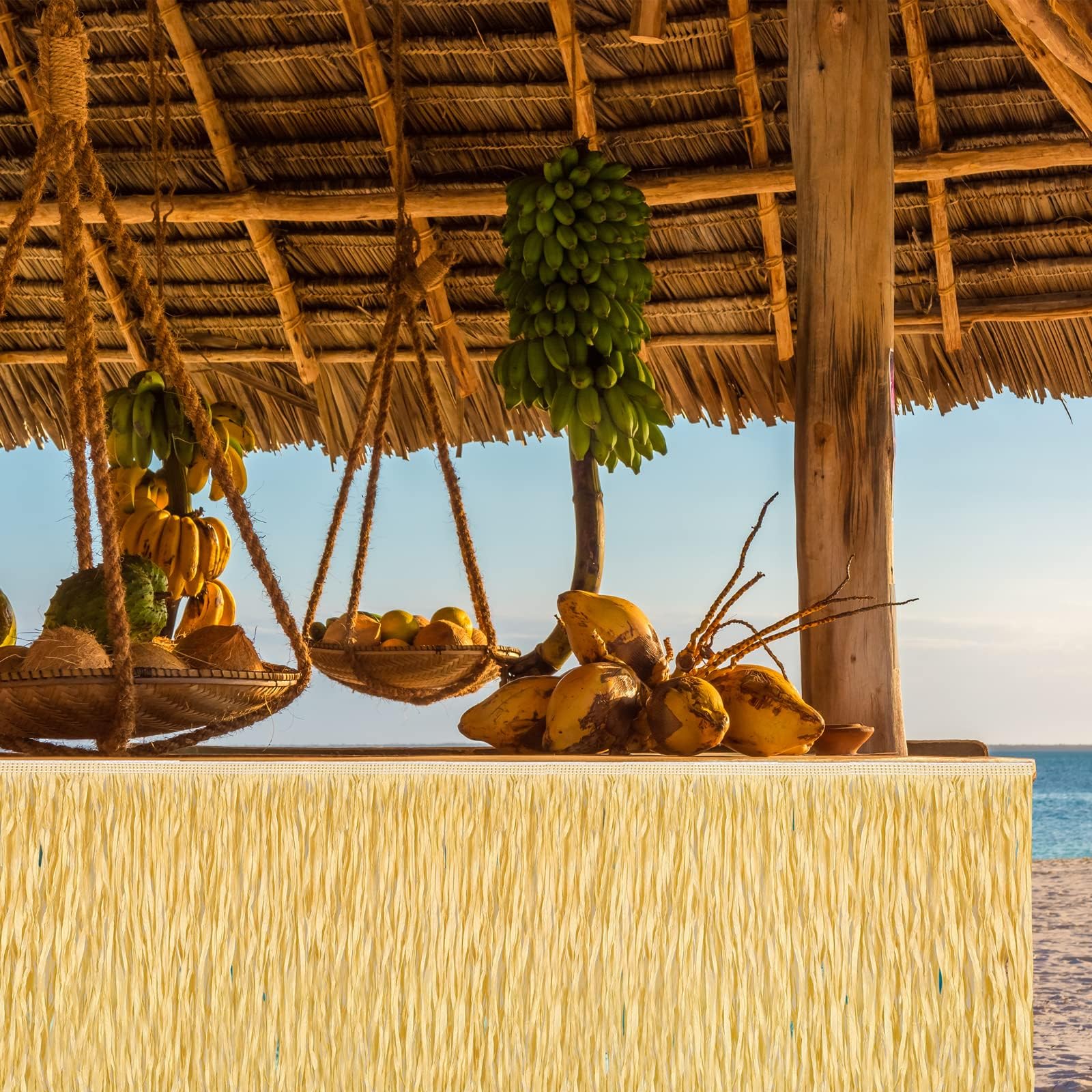 Fovths luau grass table skirt displayed on stairs or walls for dramatic effect