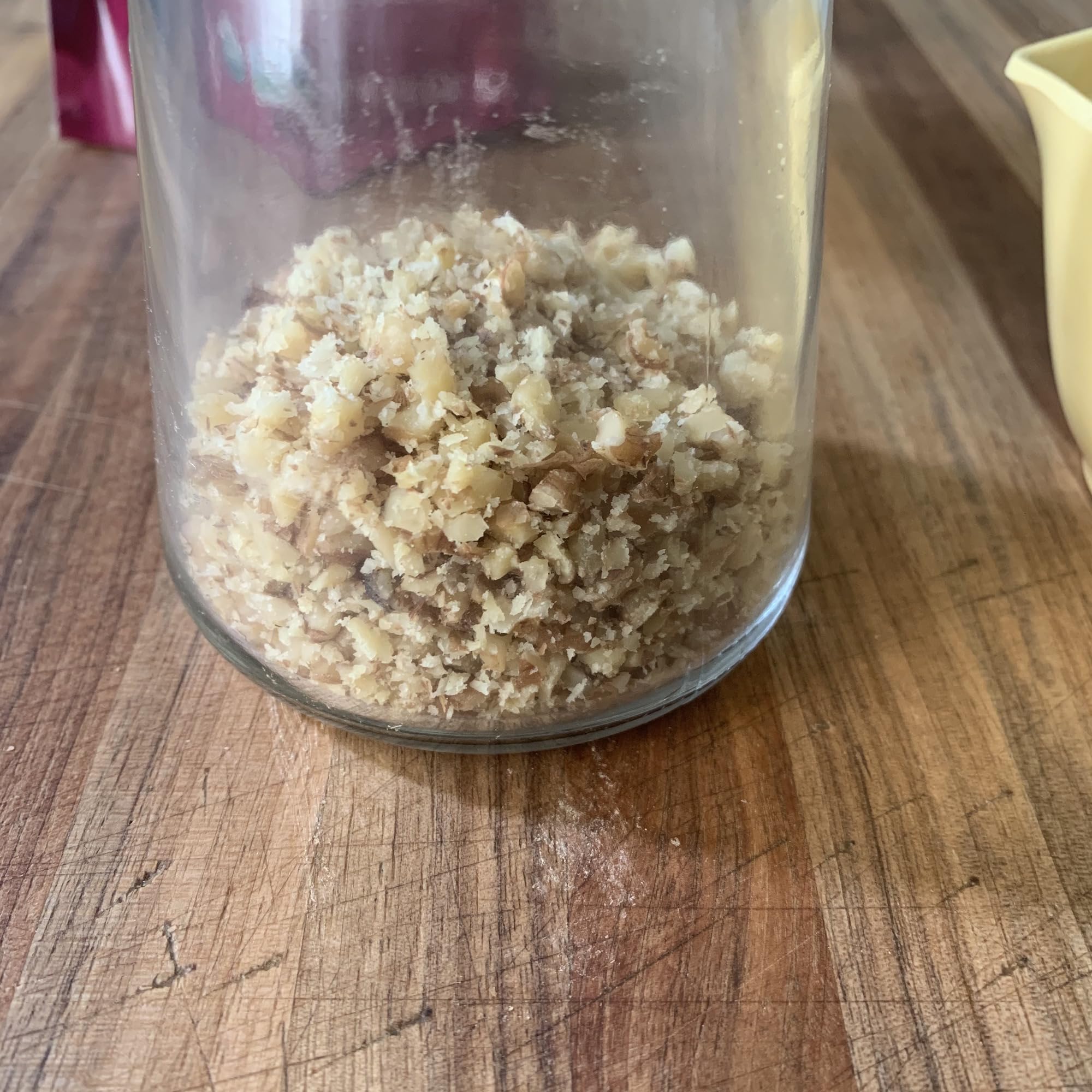 Fox Run 5716 nuts in top lid ready to chop for fresh prep