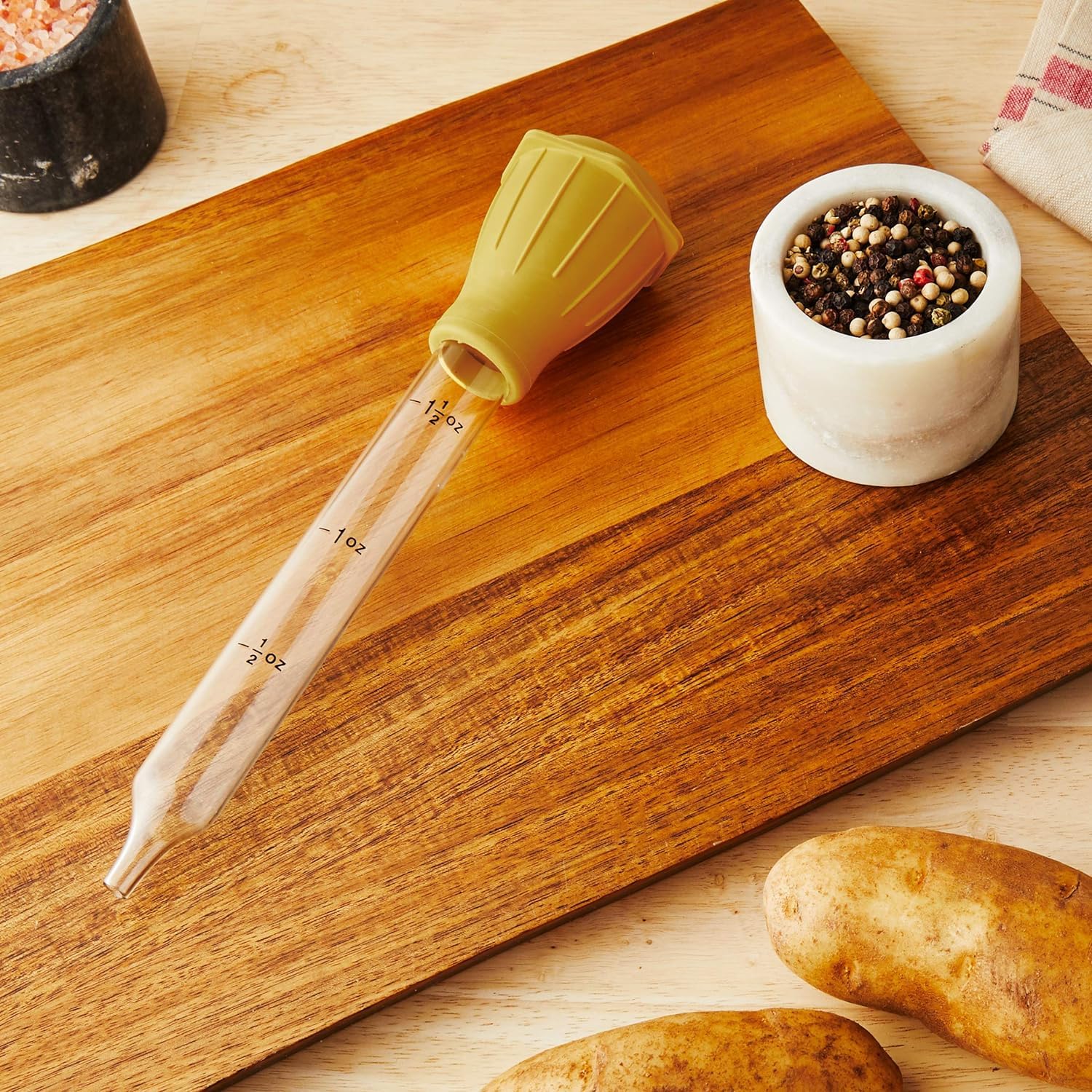 Fox Run clear glass baster body lets you monitor contents.