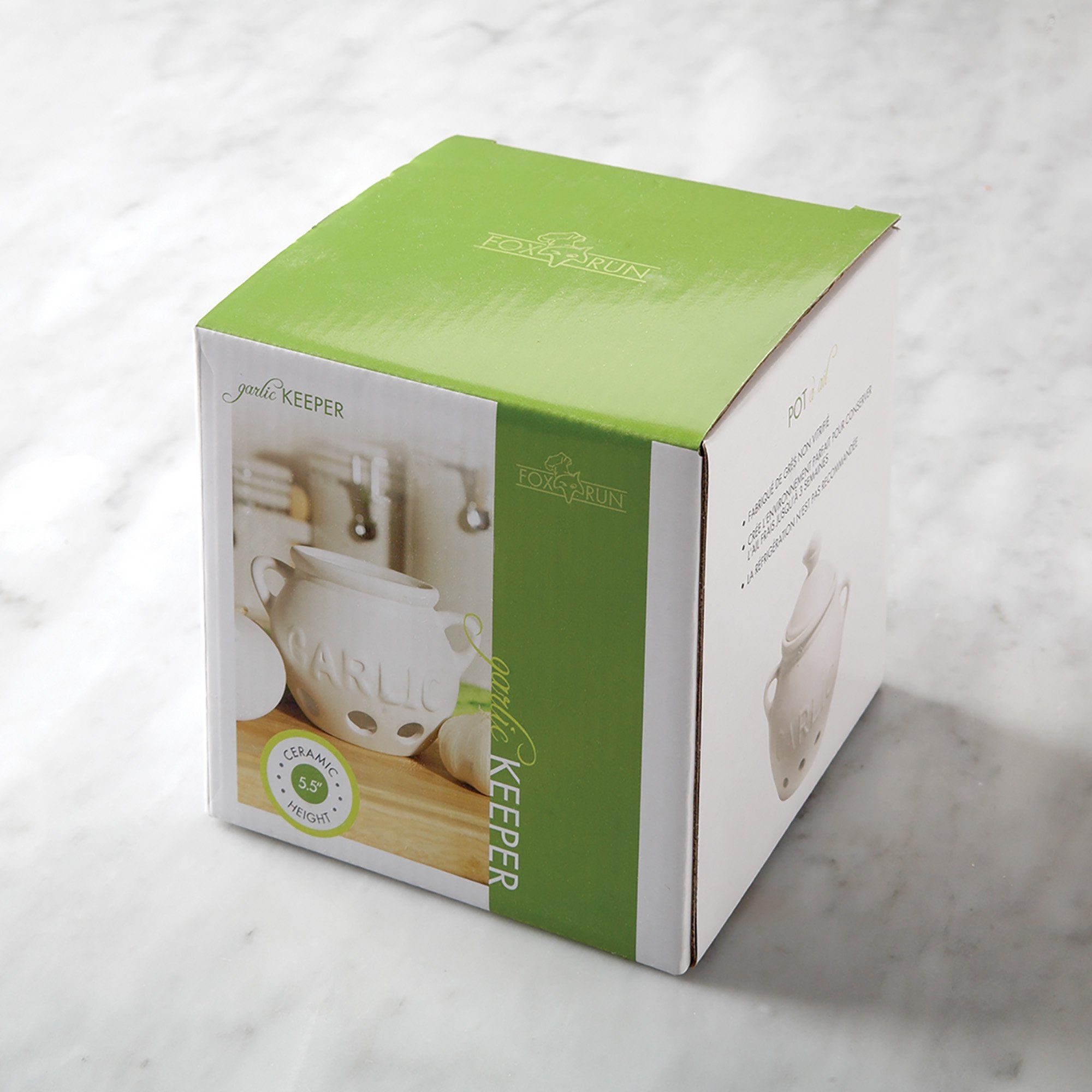Fox Run embossed garlic bulb design adds decorative touch to kitchen storage.
