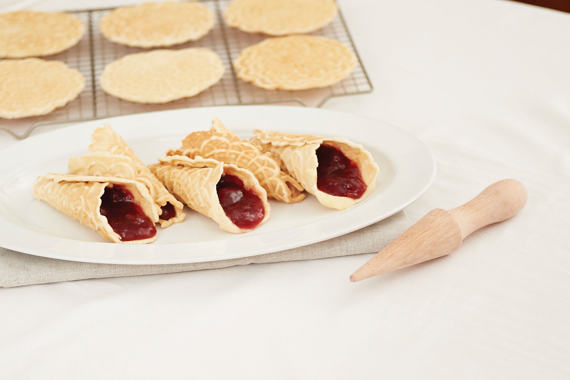 Fox Run waffle cone maker tool ready for warm batter shaping