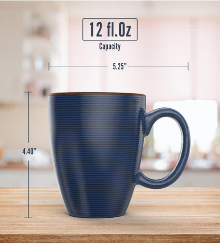 Francois et Mimi colorful ribbed mugs on kitchen shelf add lively charm.