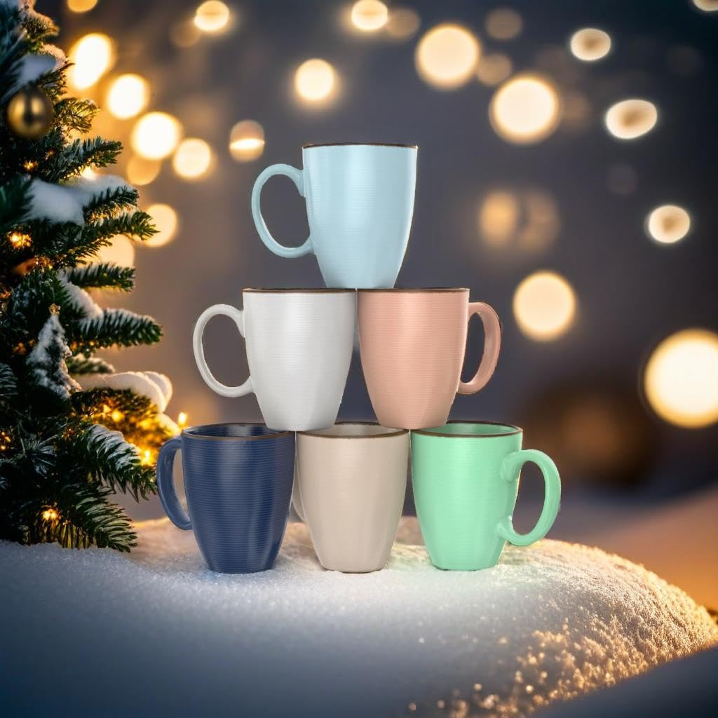 Francois et Mimi mugs on office desk for tea or cocoa breaks.