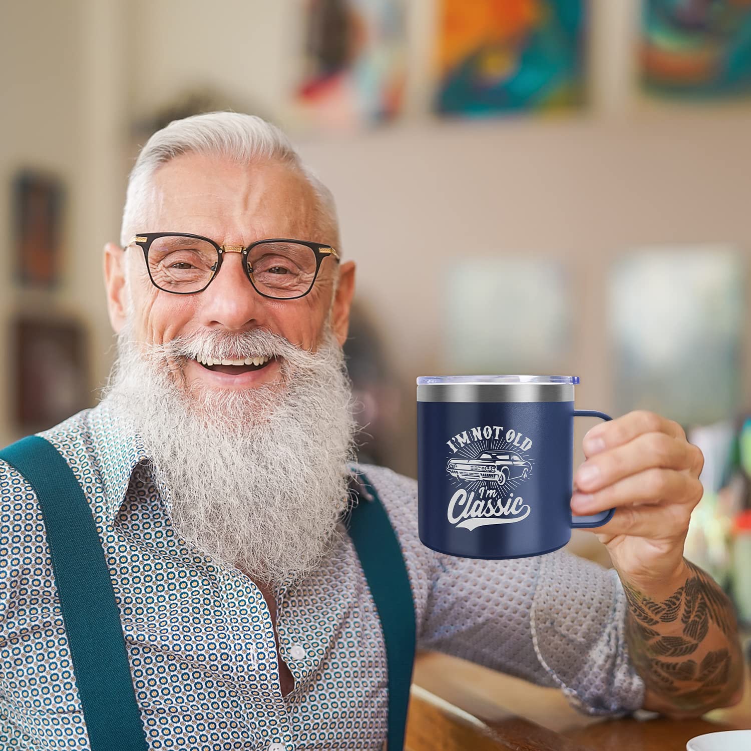 Frerdui 14oz stainless steel mug maintains temperature on the go.