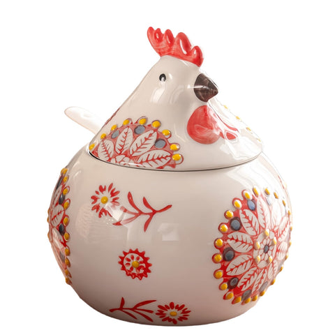 Frezonika chicken salt cellar with lid and spoon on counter, tidy spice storage.