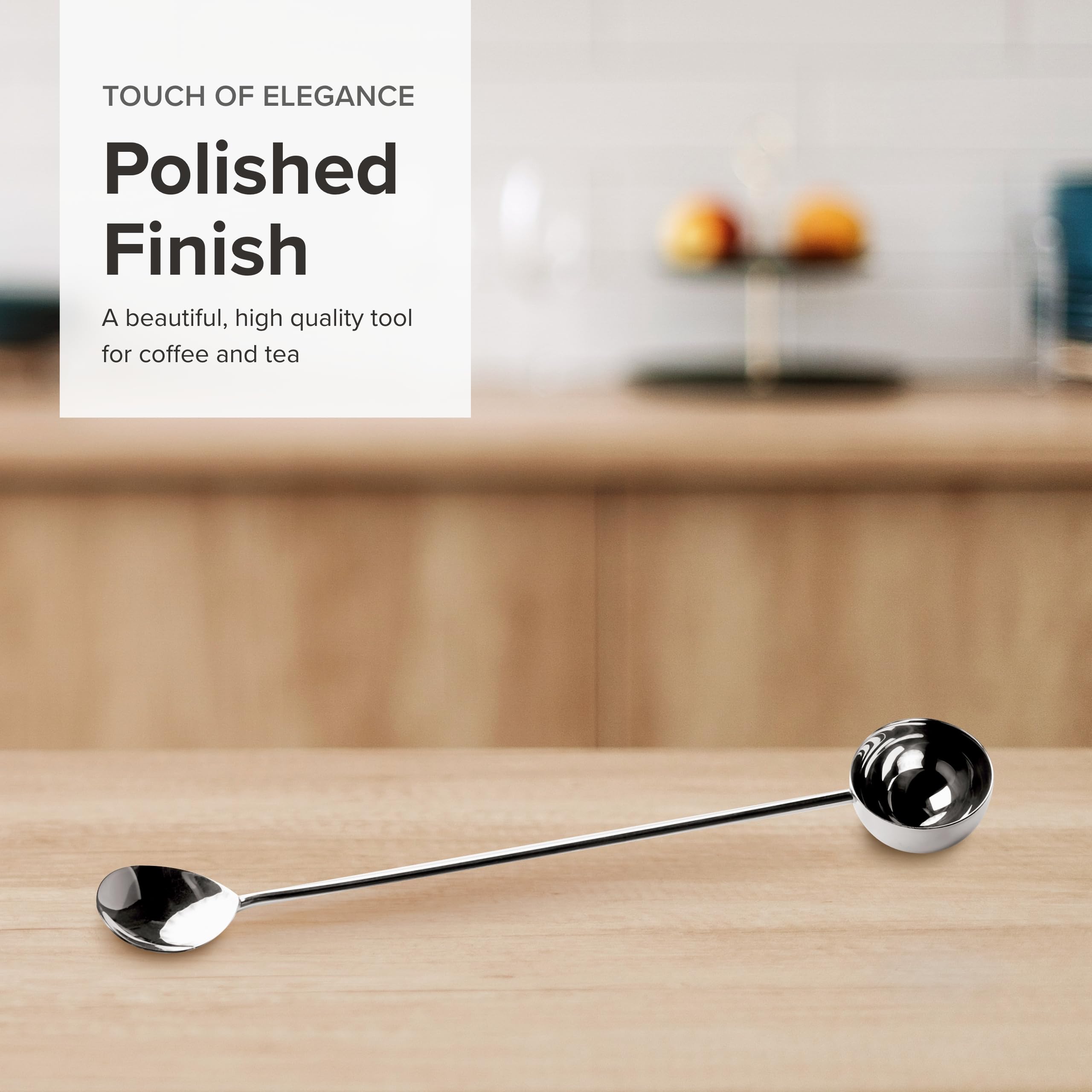 Frieling extended-handle measuring spoon reaches tall canisters for consistent scooping.