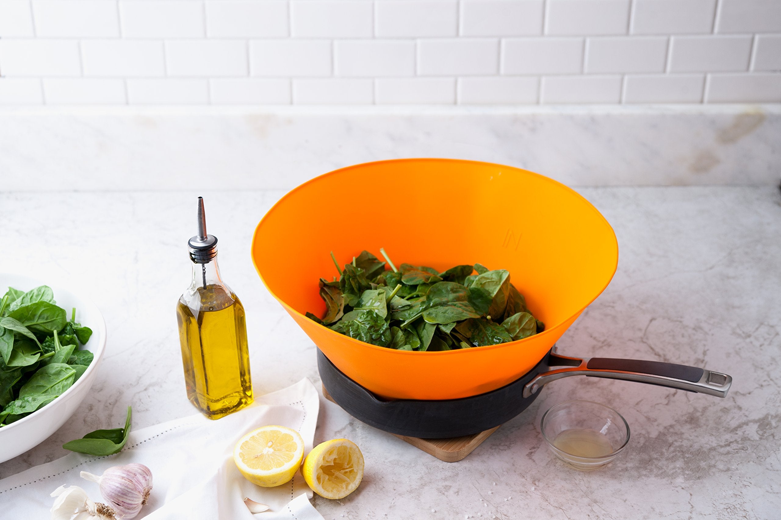 Frywall dishwasher-safe silicone cleans up quickly after cooking.