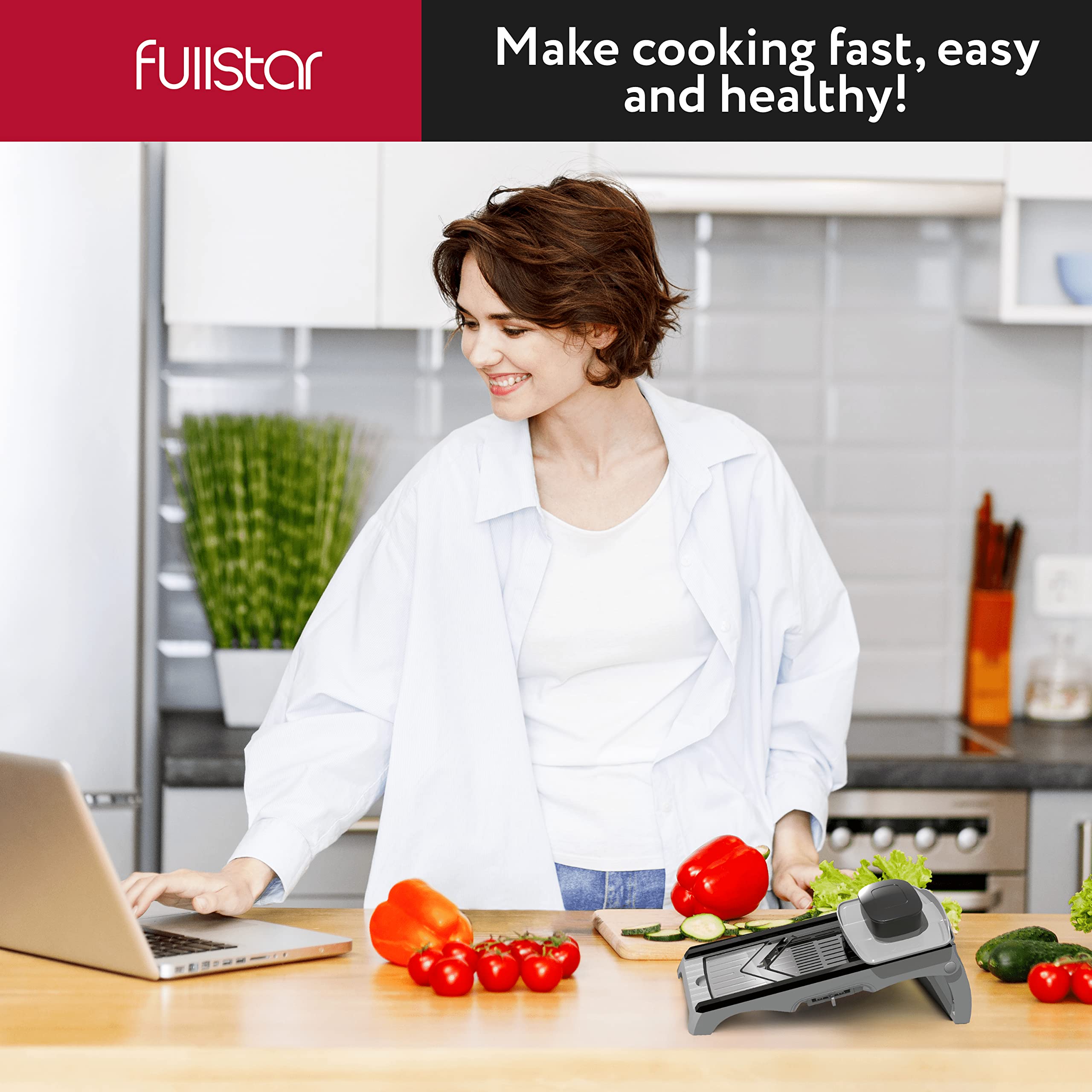 Fullstar catch-tray keeps counters tidy while slicing with blade storage.