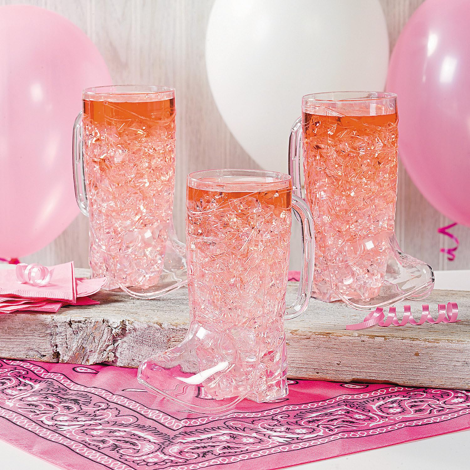 Cowboy boot mugs elevate party decor and guest photo moments.