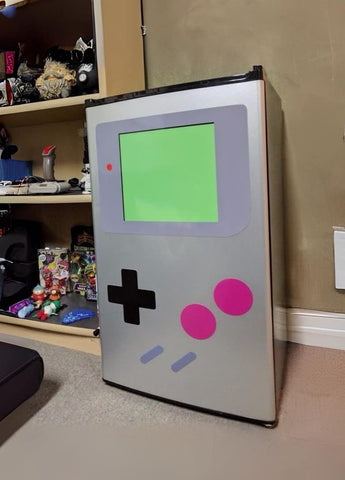 Fridge display using FridgeBoy magnets for geeky decor setup