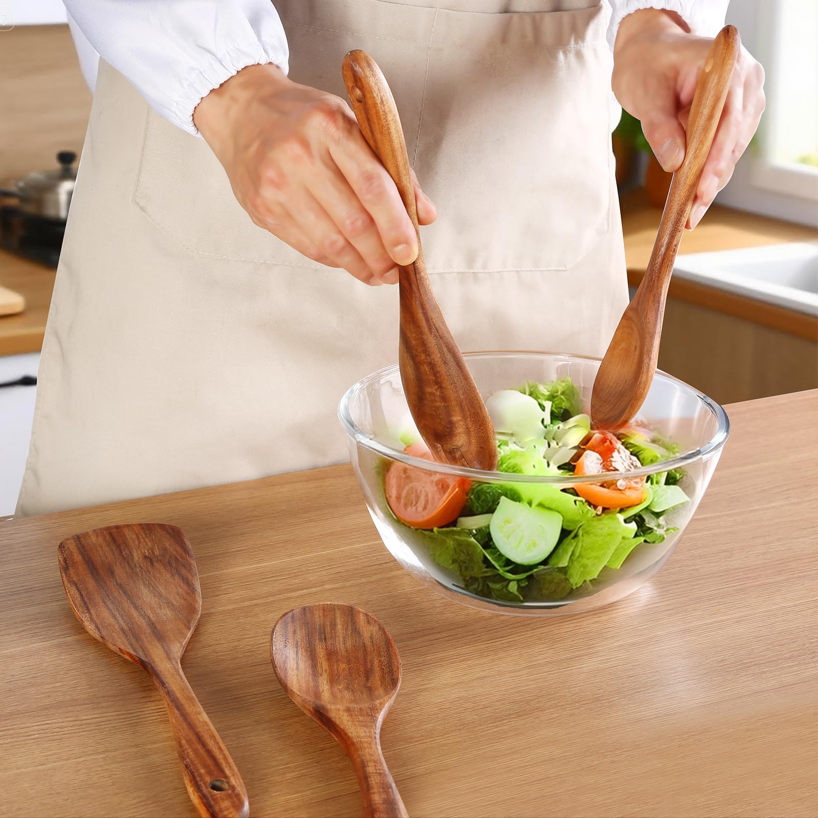 FunCee teak spoons collection includes spatulas, spoons, and serving tools.