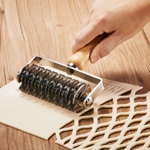 Funnans beef Wellington lattice top demonstrates professional decorative pastry prep.