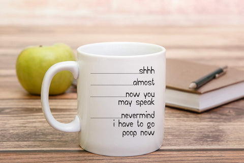 Funnwear Shh mug on a desk scene brightens office mornings.