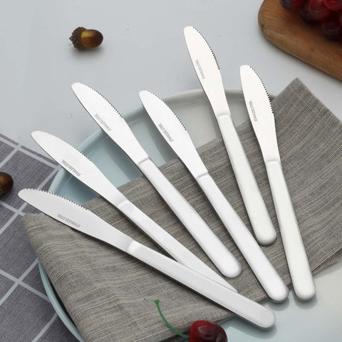 Funnydin minimalist traditional design blending with existing flatware in a modern table setting.