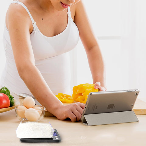 Two plastic trays included with the Fuzion scale for convenient use.
