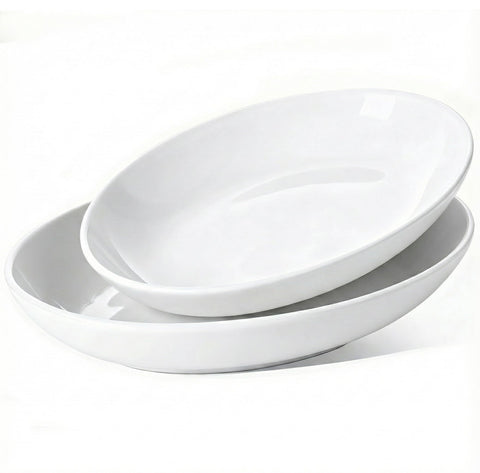 Gacoree large oval platter for turkey with deep rim to minimize spills.