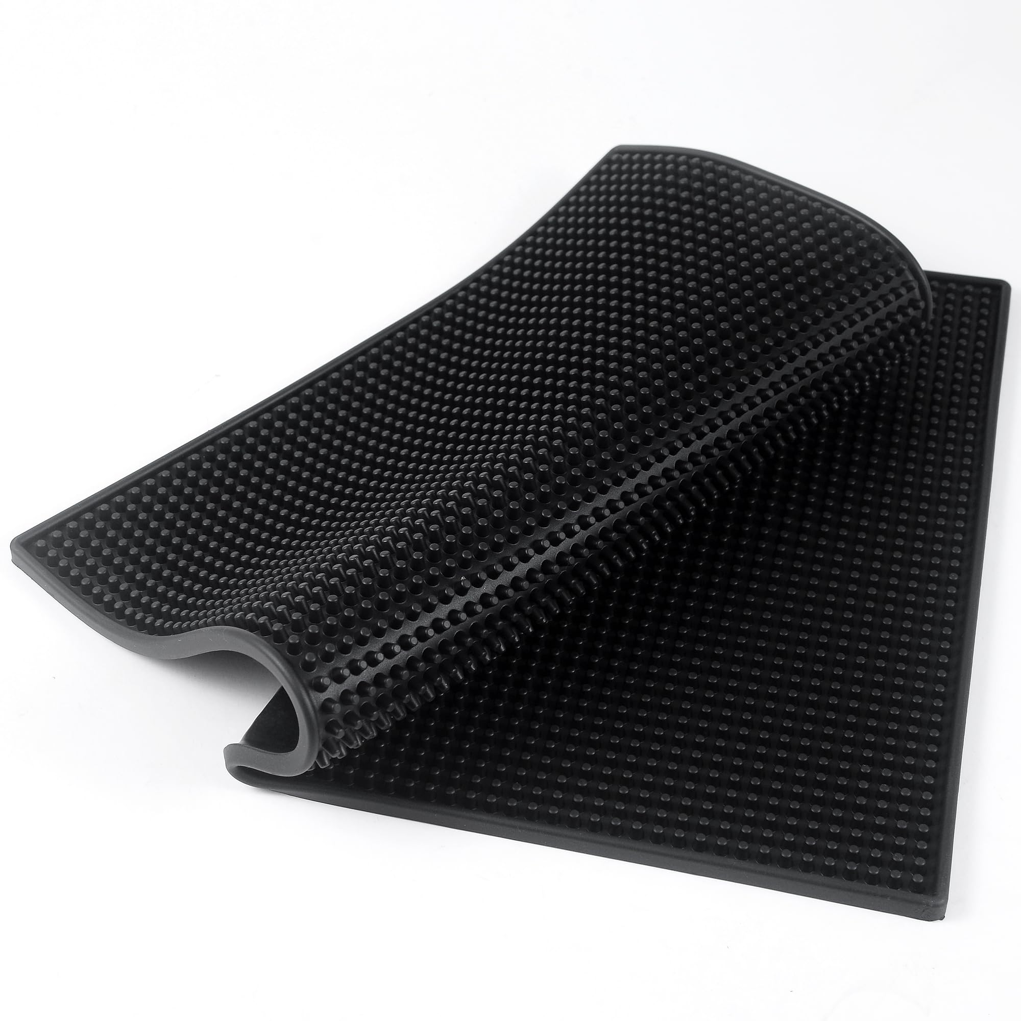 Garandad bar mat absorbs spills during cocktail preparation.