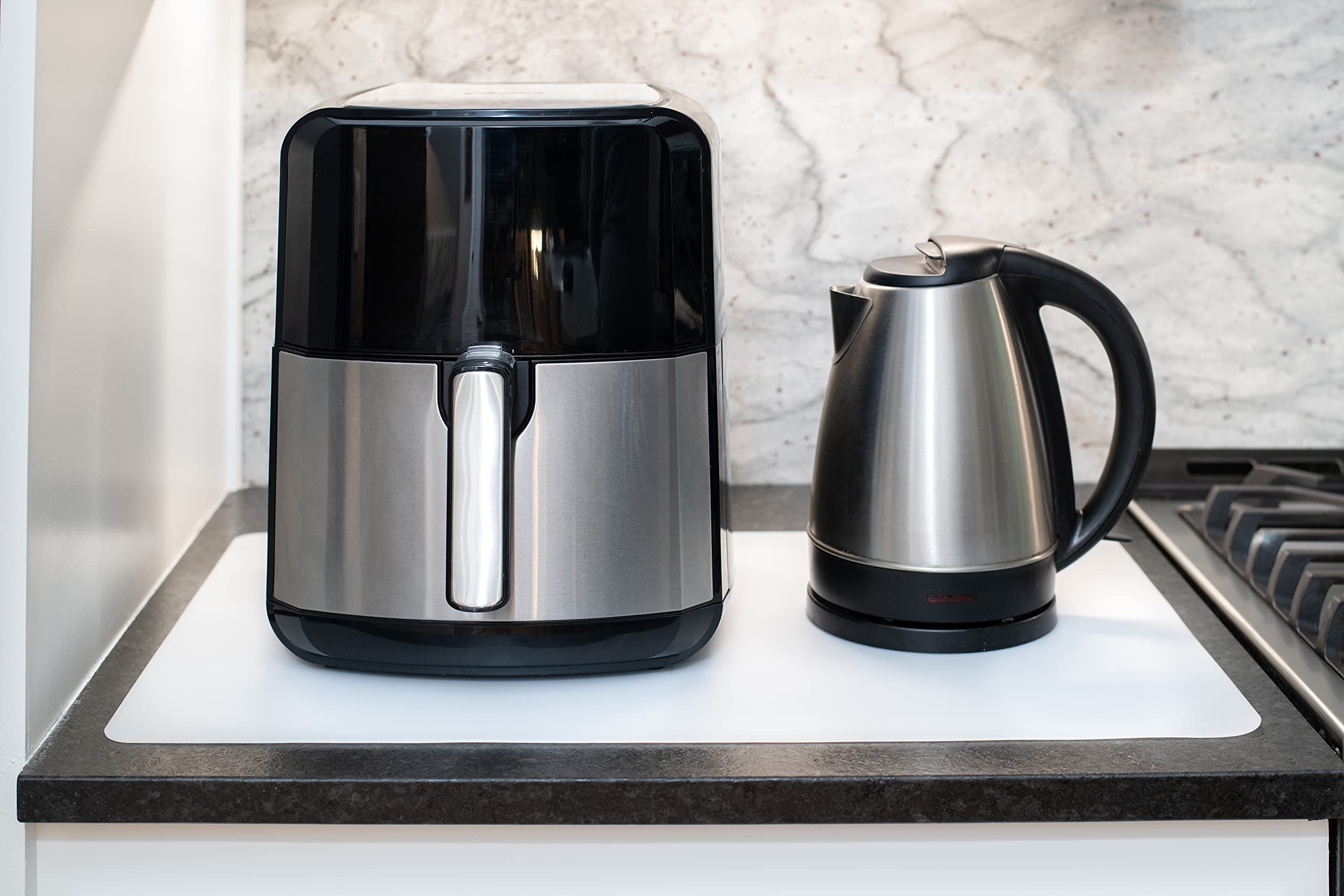 Gasare countertop protector mats provide heat resistance under ovens, air fryers, and pots.