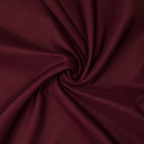 Gee Di Moda burgundy color palette tablecloth complements wedding décor tones