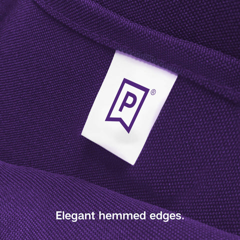 Gee Di Moda purple tablecloth paired with napkins to create cohesive event décor