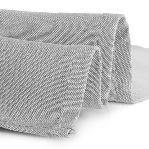 Gee Di Moda table setting on silver cloth for formal dining.