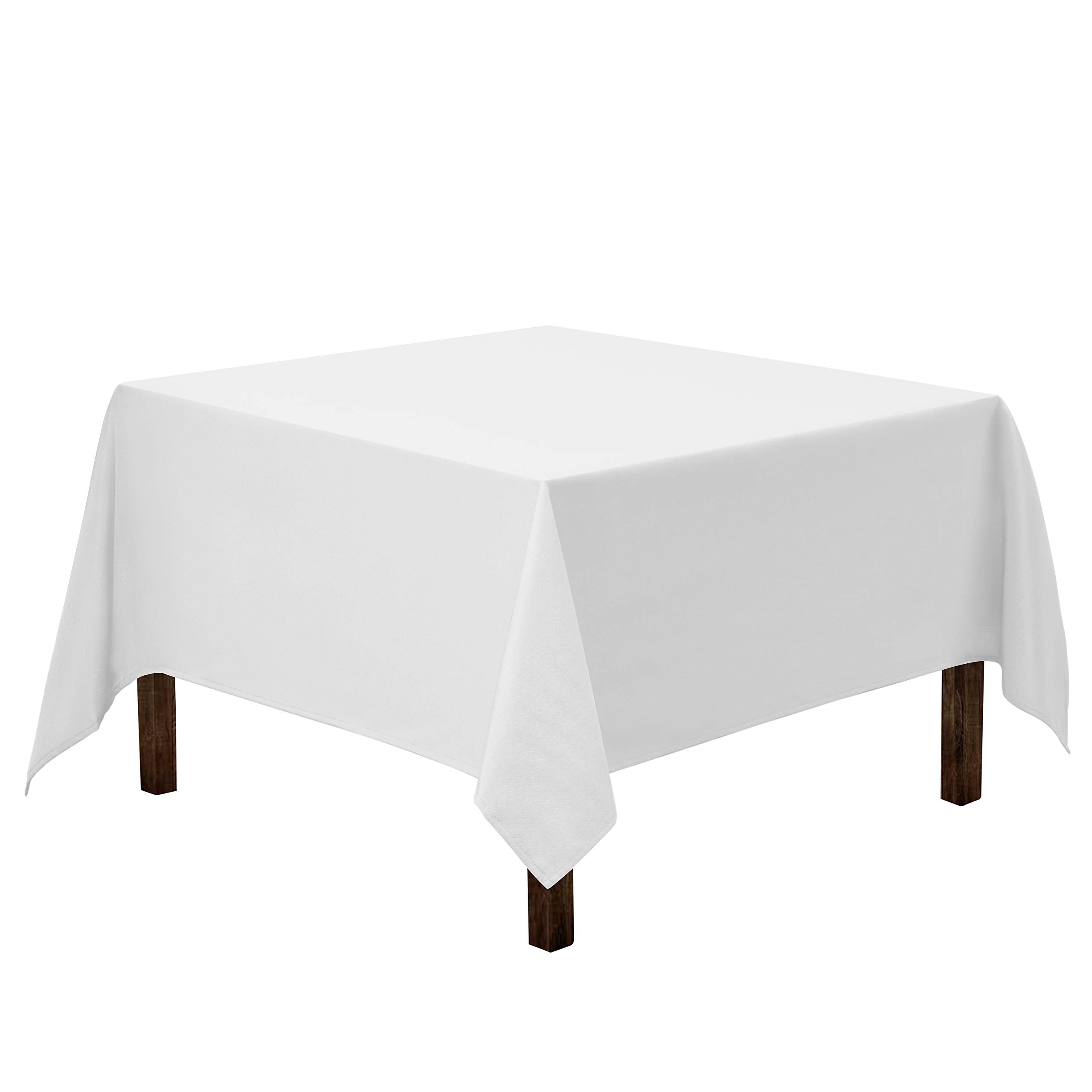 Gee Di Moda square tablecloth spread on a small table for elegant dining