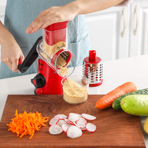 Geedel grating cheese on a wooden board for toppings and sauces.