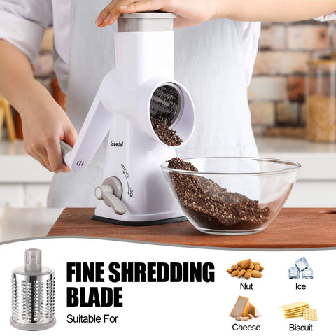 Geedel grater shredding cheese into fluffy strands.
