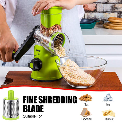 Geedel transparent barrel catching shredded cheese while rotating.