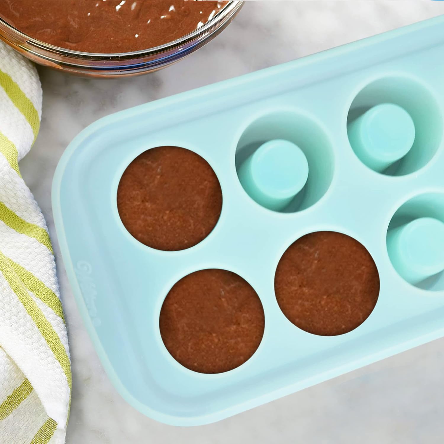 GEEOOLLAH oven-safe mold for baking cookie-shot cups.
