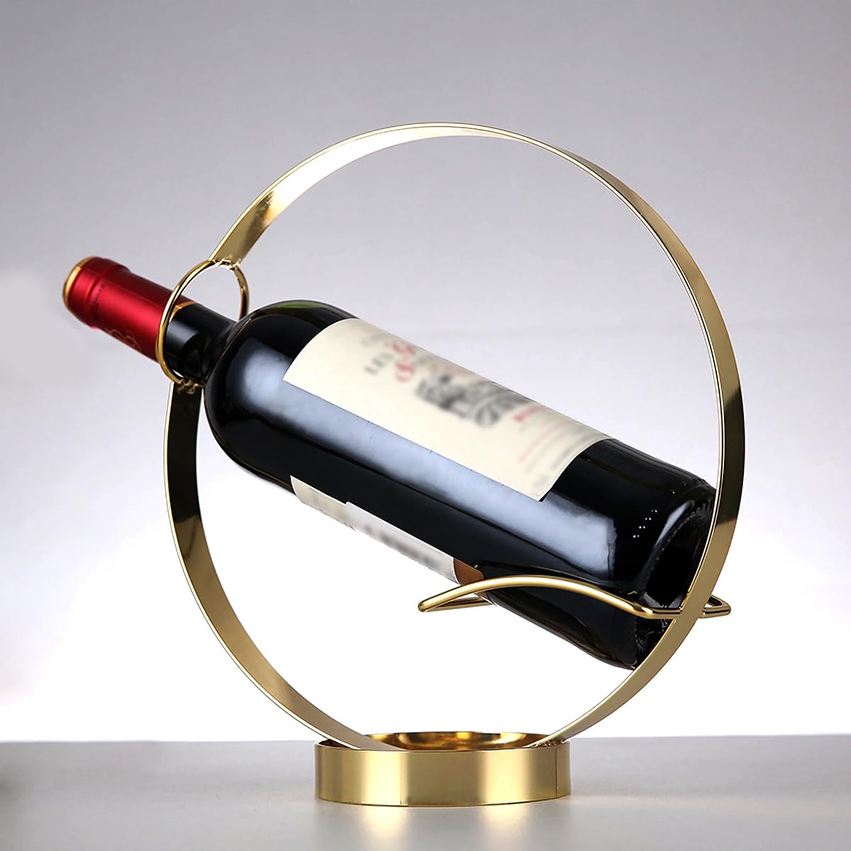 GeLive Gold Wine Bottle Holder display on a table for elegant showcase
