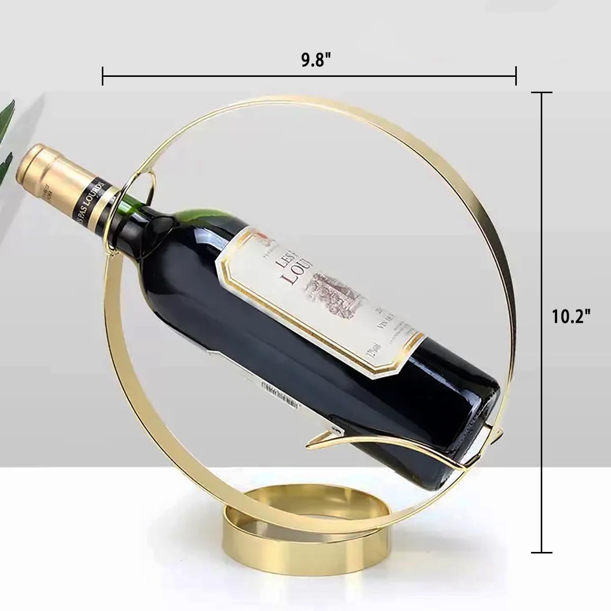 GeLive Gold iron decorative wine rack stand beside a cabinet